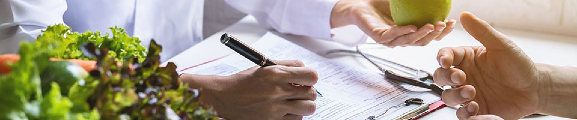 Nutritionist giving consultation to patient with healthy fruit and vegetable, Right nutrition and diet concept